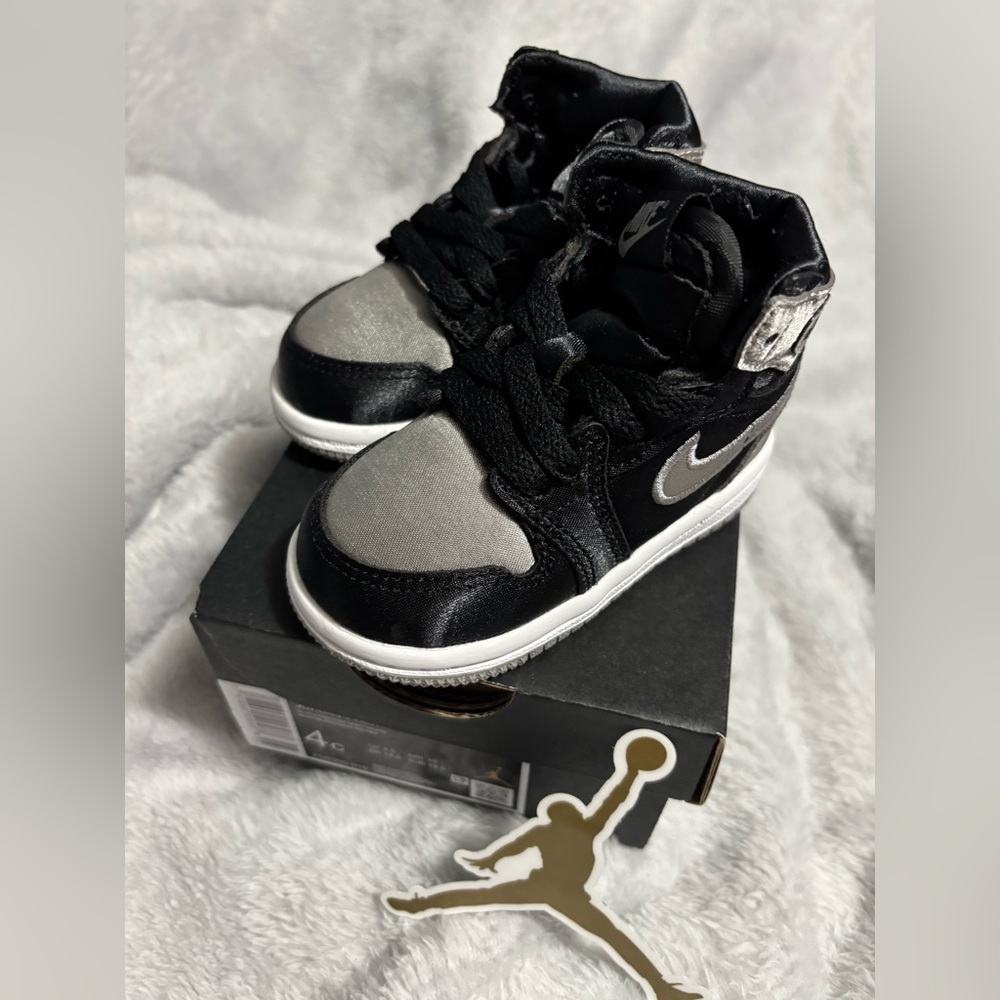 Jordan 1 Retro High OG Black and Silver Sneakers